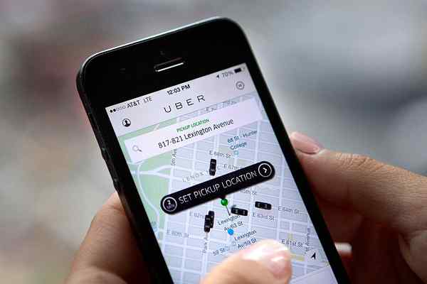 Perbedaan antara Uber dan Taksi