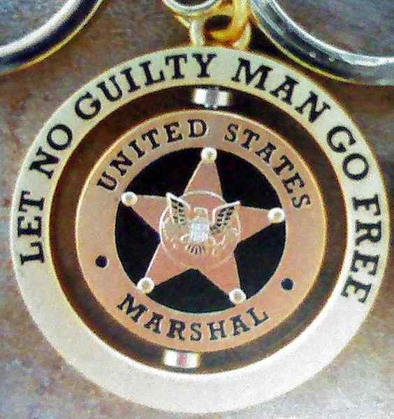 Perbezaan antara marshal FBI dan AS